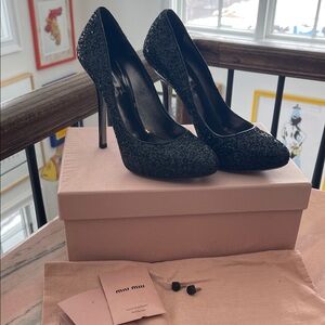Miu miu black glitter heels with metallic inner and outer soles. Bought for $595